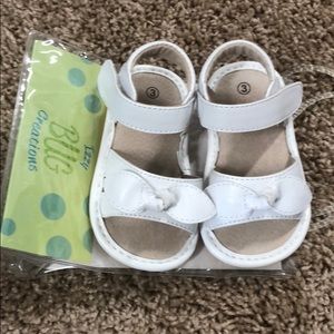 White Squeaker Sandals